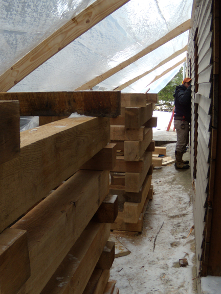 February 16, 2010. The alley between the Mayflower and the Shaw building. Preparing the outside cribbing to hold up the Shaw building during foundation reconstruction.