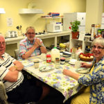 Paul and Kathleen Keet at table in Shaw House